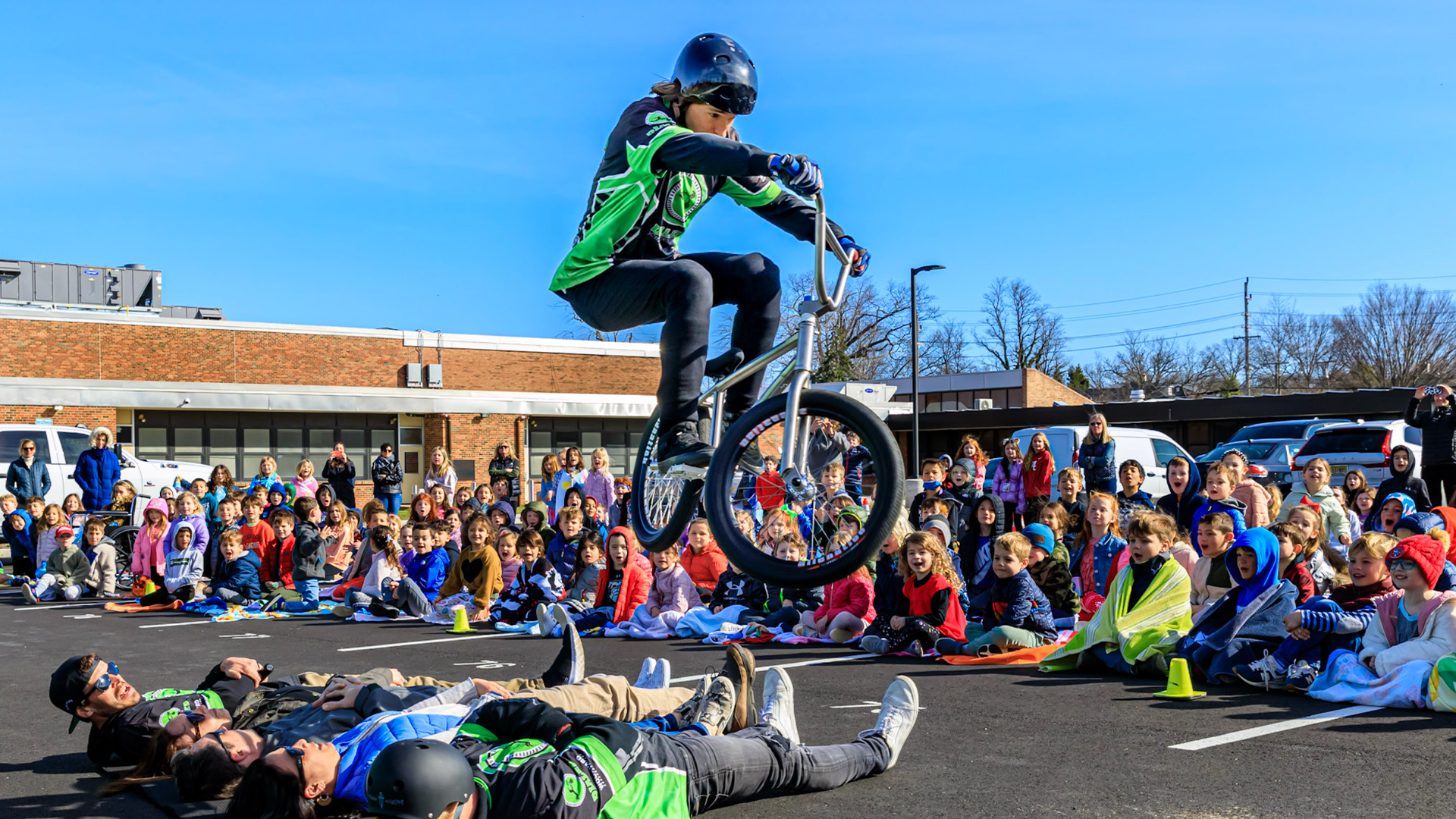 HUGE HOP! Dialed Action BMX pro clears 5 brave teachers at a school in Fair Haven New Jersey